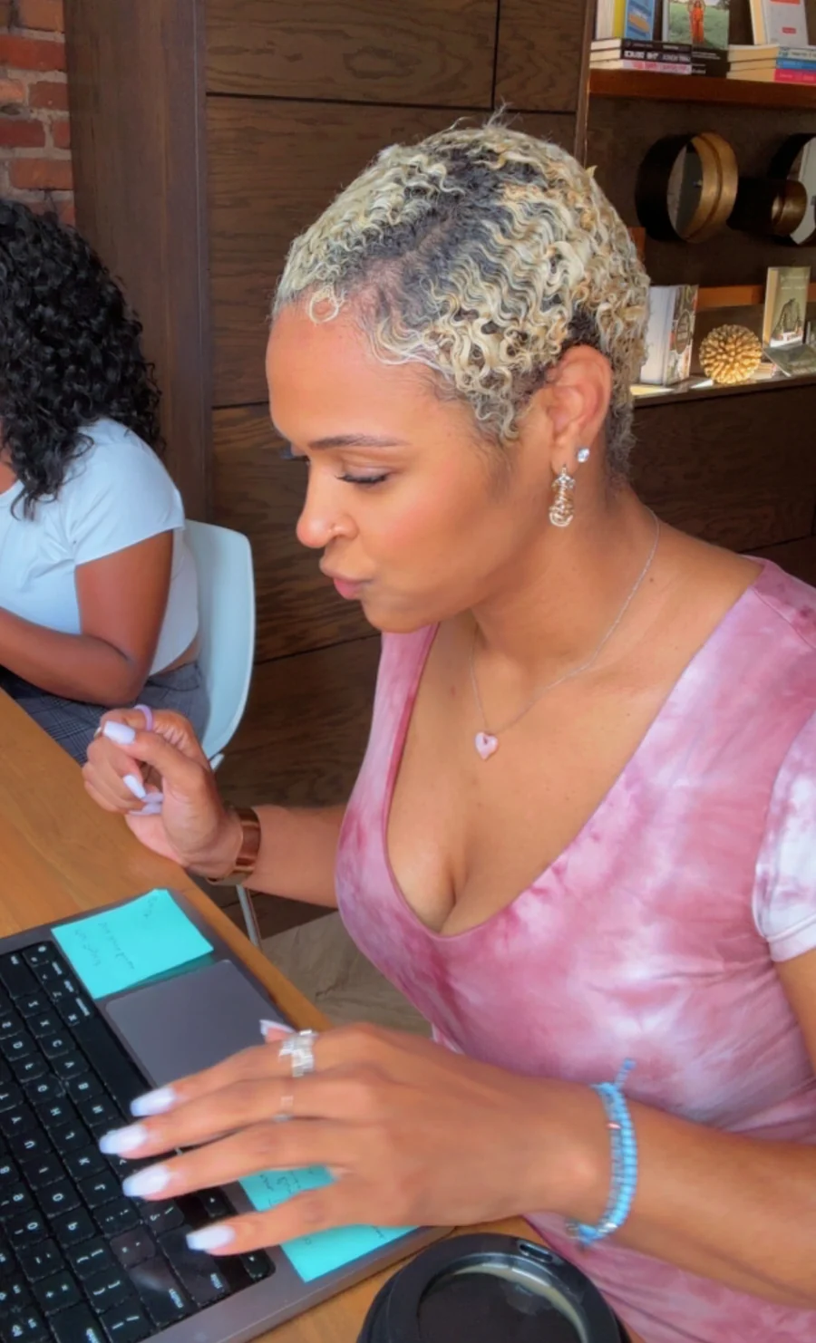 Karima Williams building on her laptop during a work session